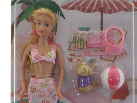 Lalka 29cm na plaży z zabawkami dmuchanymi; 32x22x4,5cm Lalka 29cm na plaży z zabawkami dmuchanymi; 32x22x4,5cm